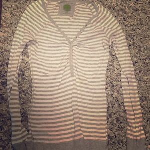 Grey and white striped henley. Size M.